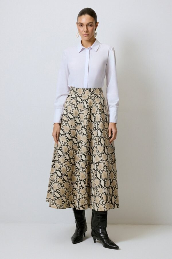 A CUT PATTERNED TABARDINE SKIRT